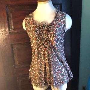 Floral sleeveless, sheer Size Small rough edged blouse by Myth
